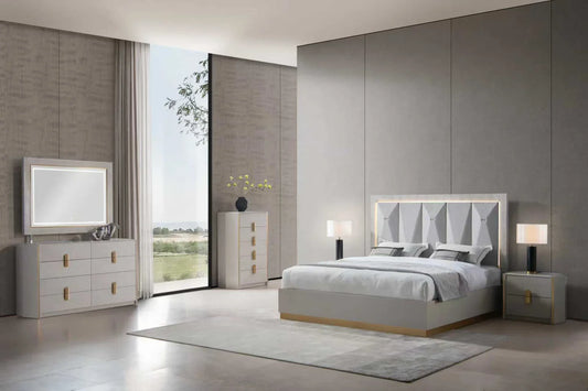 Modern bedroom with gray walls, white bed, and matching furniture.