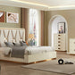 Modern bedroom with beige furniture set including bed, nightstands, and dresser.