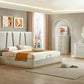 Modern bedroom with a large bed, nightstands, and dresser.