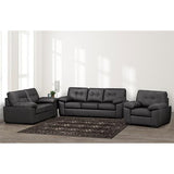 Gray sectional sofa set in a living room with a rug and decor items.