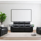 Modern living room with black leather sofa set and decorative elements.