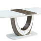 Modern dining table with a white top and brown circular base on a white background