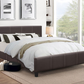 Bedroom with a brown upholstered bed, white bedding, and large windows.